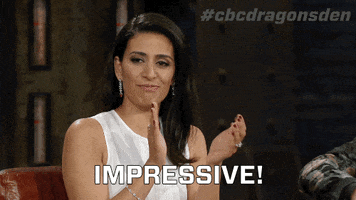 TV gif. Manjit Minhas on Dragons' Den applauds and half smiles, but doesn't really look happy, as she looks straight ahead and says, "Impressive." 