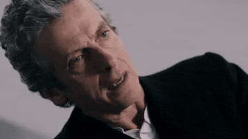 TV gif. Peter Capaldi as The Doctor in Hell Bent falls back, fainting with his mouth agape.