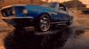 Music video gif. From the Rolling Stones video for "Ride Em All Down," a blue 1960s Ford Mustang makes a sharp U-turn on wet pavement, and its back wheel splashes water at us.