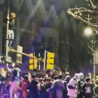 Eagles Fans Break Traffic Lights and Jump Off Ritz Carlton Awning During Super Bowl Celebrations