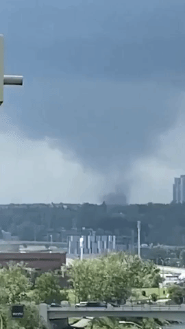 Huge Tornado Funnel Looms Over Calgary, Alberta