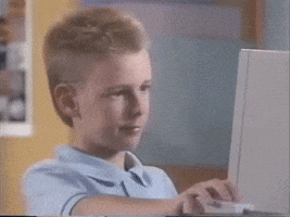 Ad gif. Sitting in front of an old computer, '90s child actor Brent Rambo gives a robust thumbs up to the camera, his mouth a confident upside-down crescent. His autograph is superimposed onto the scene, giving the impression that his stamp of approval truly matters. 