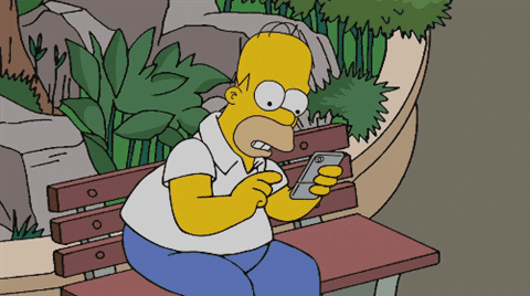 Homer Simpson Playing With Phone GIF