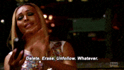 Reality TV gif. Cynthia Bailey from Real Housewives of Atlanta is scrolling through her phone and says, "Delete. Erase. Unfollow. Whatever." while Nene Leakes watches her.