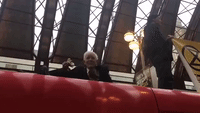 83-Year-Old Climate Change Protester Enjoys Sandwich Atop Grounded Train