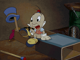 Cartoon gif. Jiminy Cricket in the original Disney Pinocchio movie kicks off his shoes and lays down in his matchbook bed. He yawns and pulls the matchbook cover like it’s a blanket.