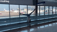 Handstands Down Moving Sidewalks