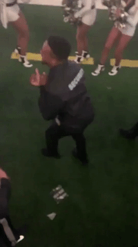 Security Guard Busts a Move During NFC Championship Game