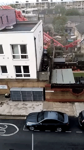 Crane Collapses on Homes in East London, Causes Injuries