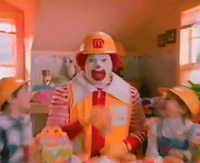 TechDogs-"Introduction"-"Ronald McDonald Excitedly Clapping in a Construction Hat with Kids in McDonald's-Themed Gear"