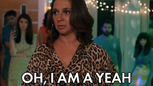 Movie gif. At a party, Maya Rudolph as Brinda in "Sisters" looks intense, bobbing her head emphatically as she says "Oh, I am a yeeeeah," which appears as text.