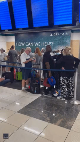 Travel Chaos Due to Severe Storms Leaves Long Line at Atlanta Airport