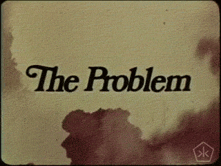 Text gif. The text reads, "The Problem," and it's edited in a vintage style, with a dark and fuzzy overlay.