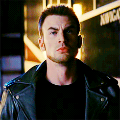 Movie gif. Chris Evans as Lucas Lee in Scott Pilgrim vs. the World stretches his neck in preparation for a fight.