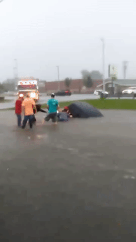 Passersby Save Woman From Car Trapped in Alabama Flood