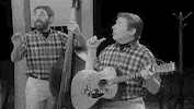 a mighty wind guitar GIF by Warner Archive