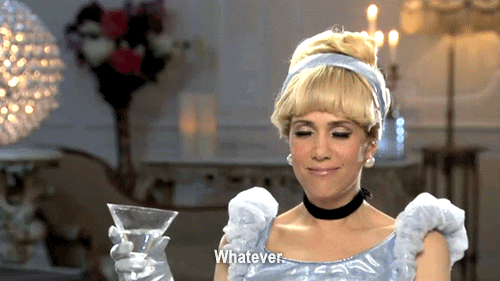SNL gif. Kristen Wiig dressed as Cinderella holds a martini glass and drunkenly wipes at her mouth, saying, "Whatever," which appears as text.