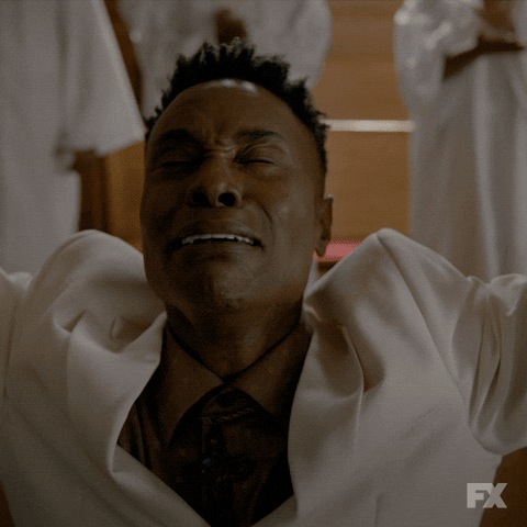 TV gif. Billy Porter as Pray Tell in Pose dressed all in white stands in front of members of a choir, also dressed in white. With his eyes closed, sobbing, and his arms raised to the heavens, the man says, "Oh, thank you, God," which appears as text.