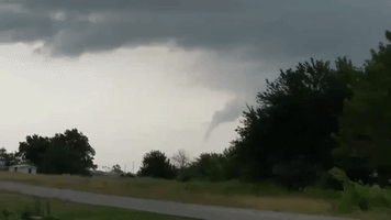 Possible Funnel Cloud Descends From Stormy Sky Near Checotah, Oklahoma
