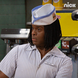 TV gif. Kel Mitchell as Ed in Good Burger dressed for work. He looks to the side with attitude and leans back, wide eyes repeatedly blinking with great speed.