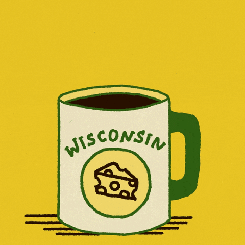 Digital art gif. Green mug full of coffee featuring a piece of cheese labeled “Wisconsin” rests over a yellow background. Steam rising from the mug reveals the message, “Vote early.”