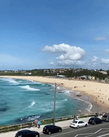 Air-Raid Sound Deployed to Disperse Crowd from Sydney Beach to Enforce Social Distancing