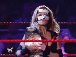 trish stratus wrestling GIF by WWE