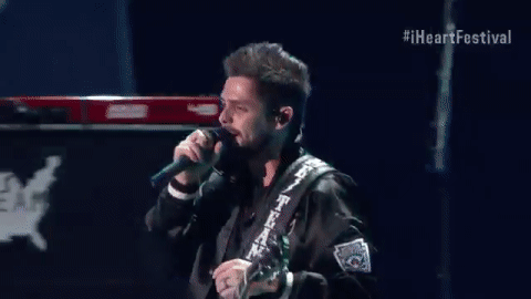 pointing smile GIF by iHeartRadio