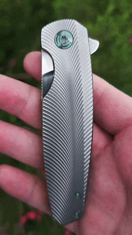 nilknarf1 morpheus green machine feather cut m390 GIF