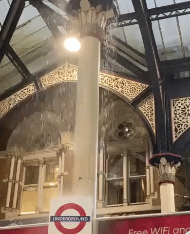 Rain Cascading into London's Liverpool Street Station Delays Trains