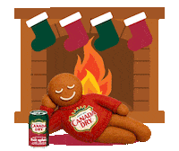 Sponsored gif. A gingerbread cookie in a Canada Dry sweater is lounging in front of an illustrated fireplace with red and green stockings. A can of Canada Dry Fruit Splash sits next to the cookie. 