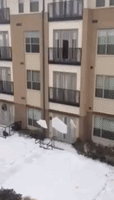 Ice Cascades Off Roof in Plano, Texas