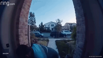 Home Security Camera Captures Amazon Delivery Man Playing Hopscotch in California