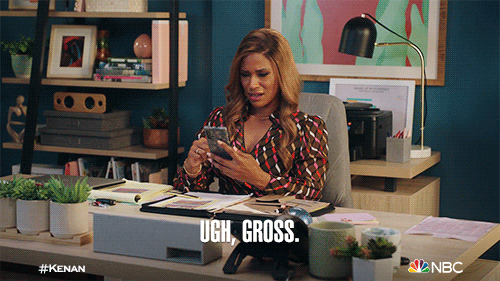 TV gif. Kimrie Lewis as Mika in Kenan. She's sitting in her office and looking at her phone. She scrolls down and peers closer before scrunching her face and saying, "Ugh, gross."