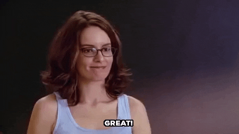 Movie gif. Tina Fey as Ms. Norbury in Mean Girls Stands in front of a blackboard. She gestures with her fists as if to say, "All right!" Text: Great!