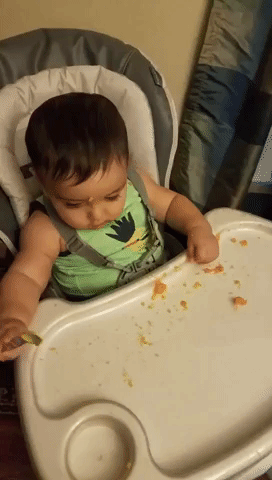 This Adorable Baby Loves Sweet Potatoes