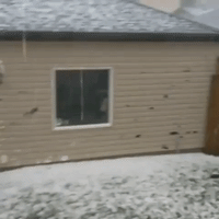 Hail Punches Holes in Siding of Homes in Calgary