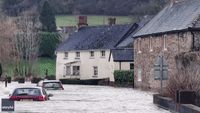 Cars Partially Submerged in Devon as Flooding Hits England
