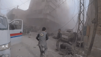Rescuers Search for Survivors After Dozens Reported Killed by Airstrikes in Douma