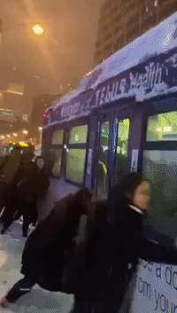 Vancouver Commuters Lean In as Bus Struggles in Snow