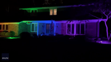 Wisconsin Couple Light House in Pride Colors 