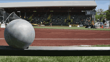 shot put track GIF by RunnerSpace.com
