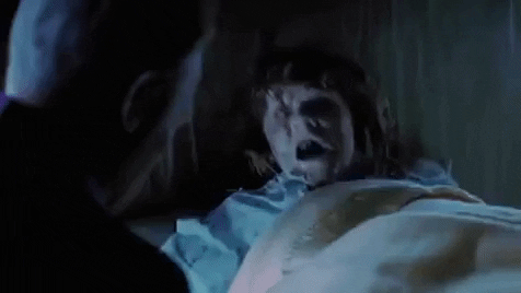 possessed the exorcist GIF