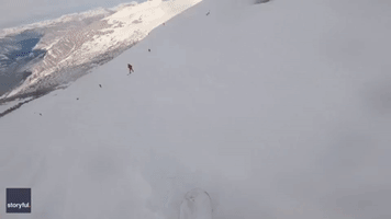 Good Samaritans Rush to Dig Out Snowboarders Buried in Avalanche