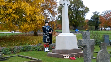 Lone Piper Marks Armistice Day at Northamptonshire Church
