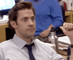 The Office gif. John Krasinski as Jim pumps his fist as his eyes grow wide and he says, "Yes!"
