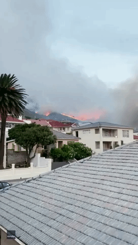 Strong Winds Blow Smoke From Mountain Fire Onto Highway in Cape Town
