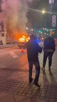 Police Vehicle Set Alight Amid Protests in Downtown Atlanta