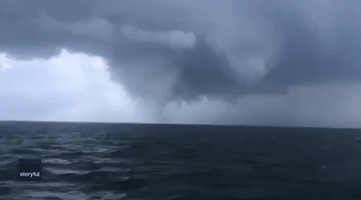 Waterspout and Ominous Clouds Hover Over Baltic Sea