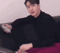 Looks Around GIF